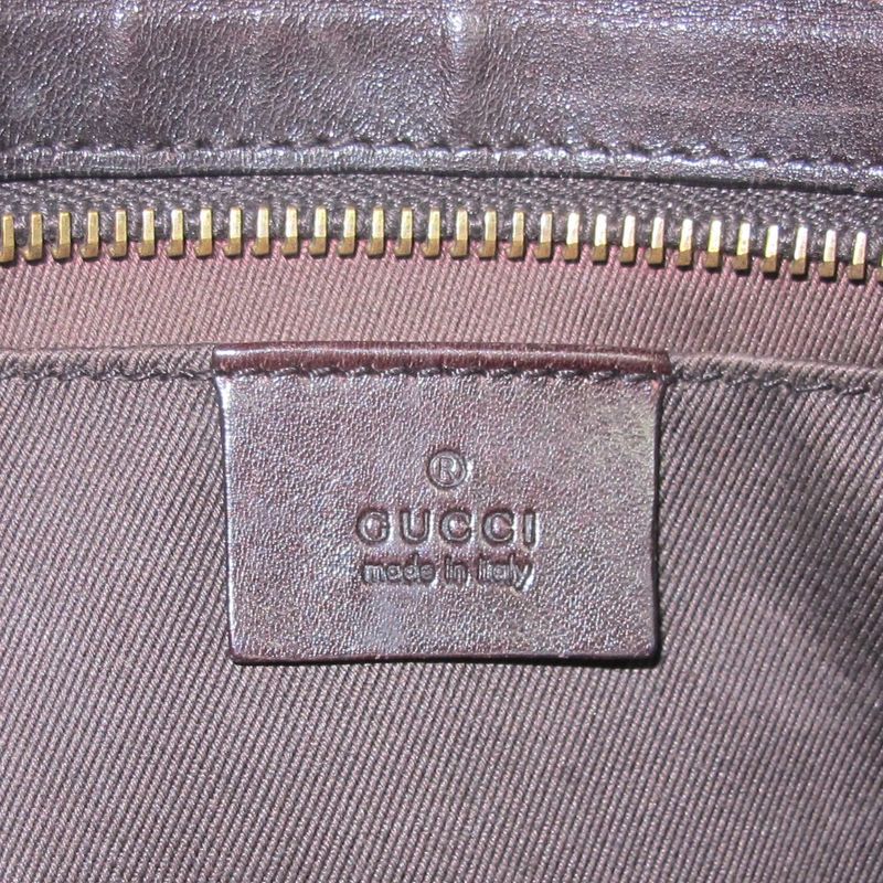 Bolsa-Gucci-Canvas-GG-Pochette