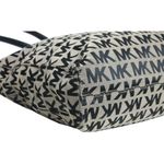Bolsa-Michael-Kors-Jet-Set-Monograma
