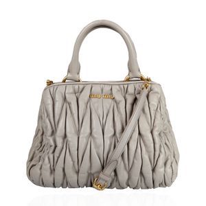 Bolsa Miu Miu Coffer Couro