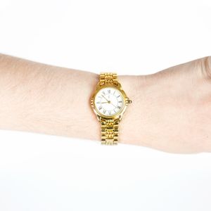 Relógio Saint Laurent Dourado