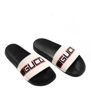Sandália Slide Gucci de Borracha Branca e Preta