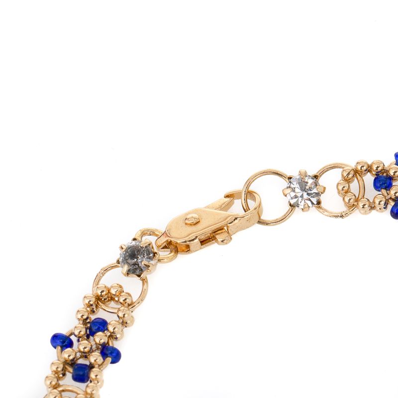 Pulseira-dourada-elos-e-micangas-azuis