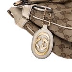 Bolsa-Gucci-Sukey-GG-Supreme-e-Verniz-Bege