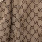 Bolsa-Gucci-Sukey-GG-Supreme-e-Verniz-Bege