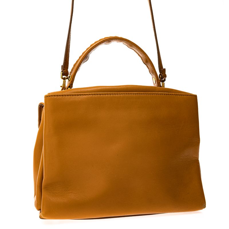 Bolsa-Paula-Cademartori-Dun-Dun-Couro-Caramelo-e-Spikes