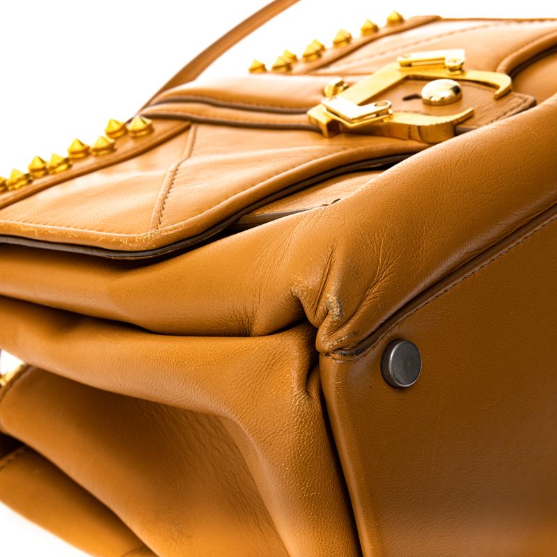 Bolsa-Paula-Cademartori-Dun-Dun-Couro-Caramelo-e-Spikes