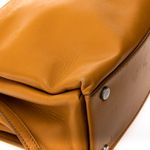Bolsa-Paula-Cademartori-Dun-Dun-Couro-Caramelo-e-Spikes