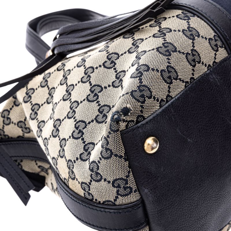 Bolsa-Gucci-Rania-GG-Canvas-e-Faixa-Web