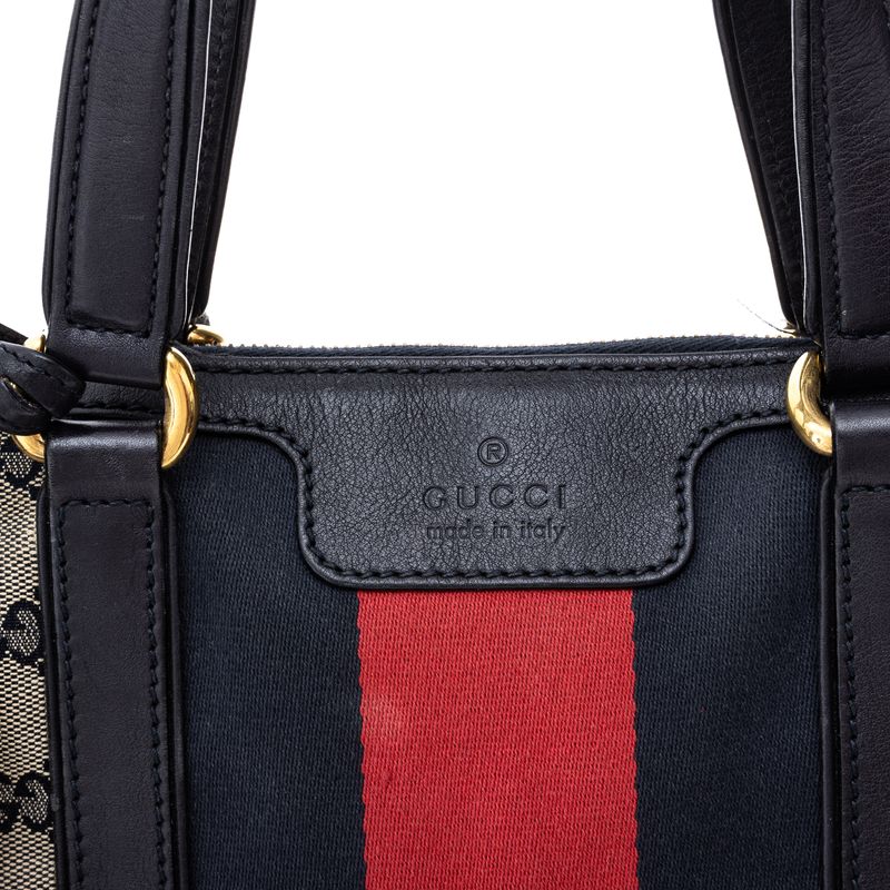 Bolsa-Gucci-Rania-GG-Canvas-e-Faixa-Web