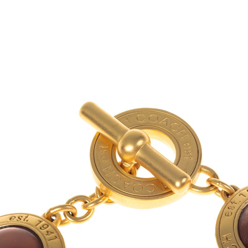 Pulseira-Coach-Circulos-Dourado-e-Rose