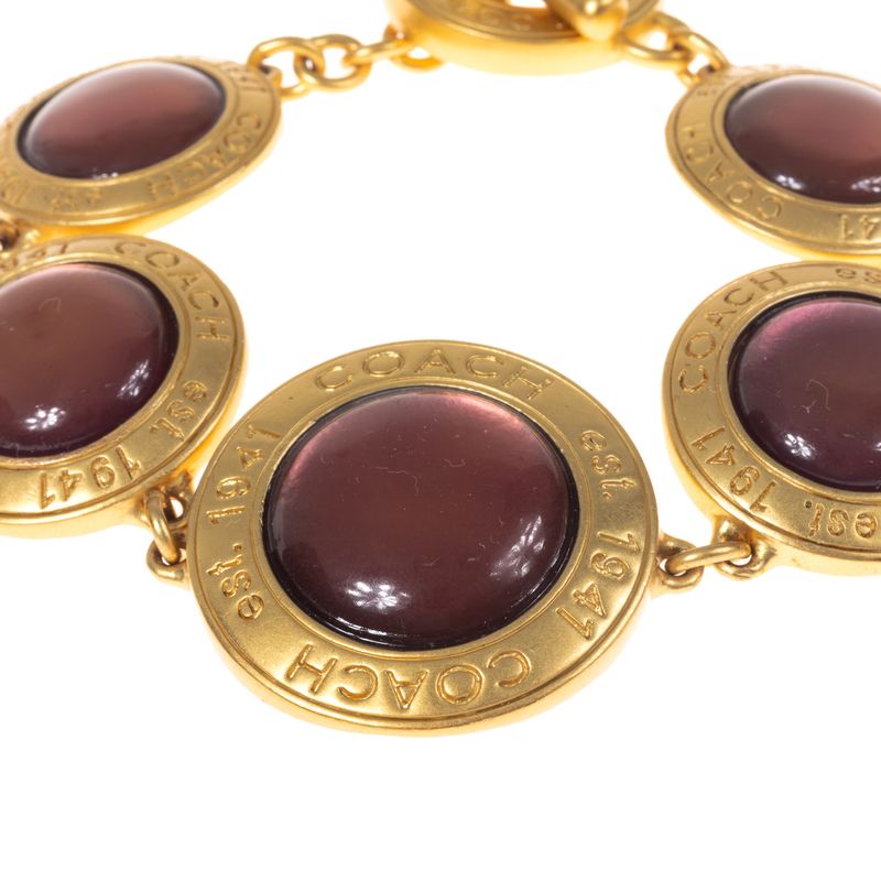 Pulseira-Coach-Circulos-Dourado-e-Rose