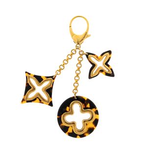 Chaveiro Louis Vuitton Charm Fleur de Monogram