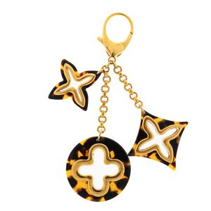 Chaveiro Louis Vuitton Charm Fleur de Monogram