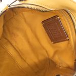 Bolsa-Coach-Camera-Floral-Amarela