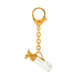 Chaveiro Swarovski Golf Dourado